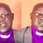 A middle-aged man wearing glasses, a purple clerical shirt, and a grey jacket speaks during an interview, shown in two side-by-side frames against a plain background.