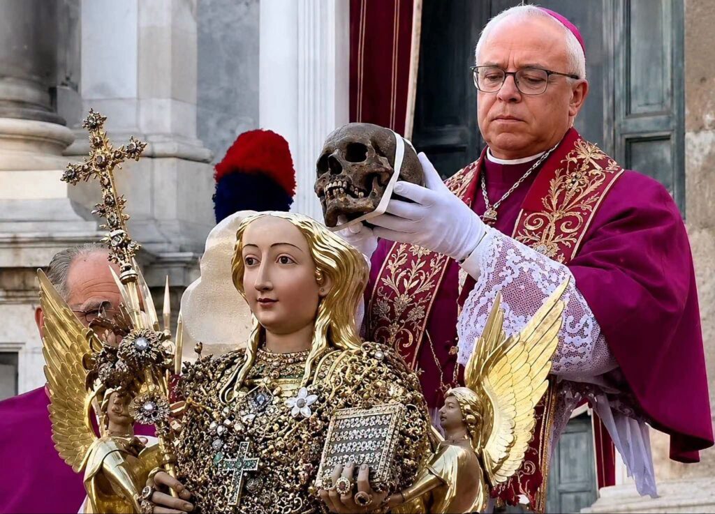 Controversy as Vatican cardinal kisses, bows to 1,700-year-old skull of Saint Agatha 