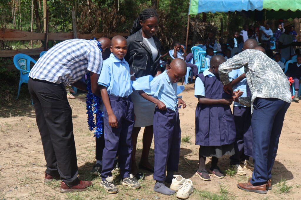 Douglas Opijah continues school uniform donation drive, support for women groups